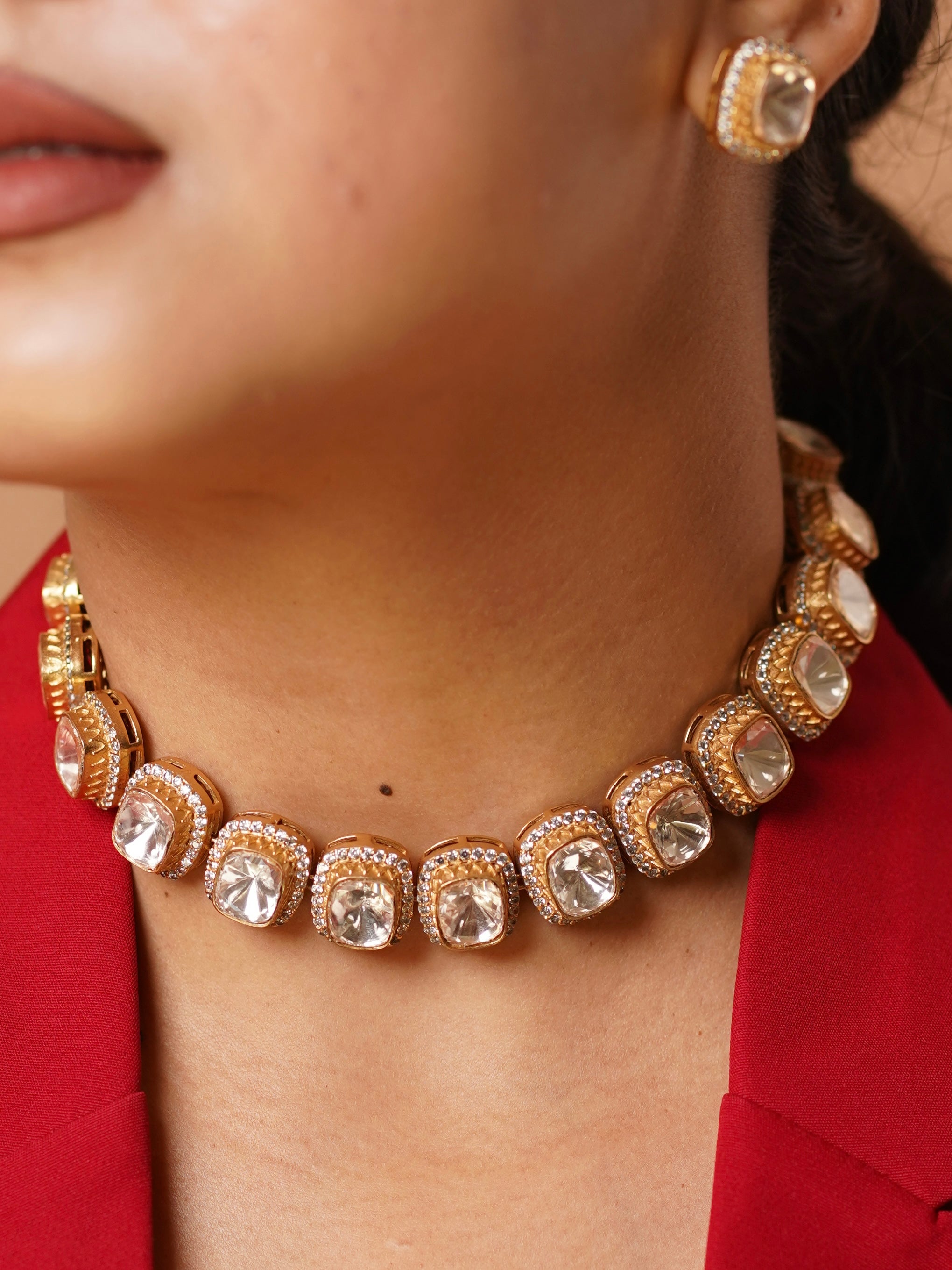 Close-up of polki-style choker with micro pavé border and matching earrings